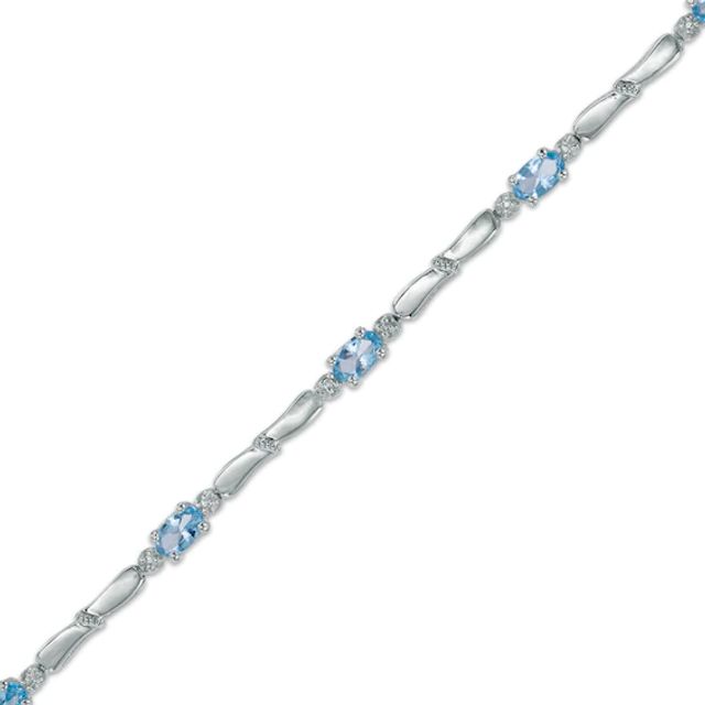 Oval Swiss Blue Topaz and Diamond Accent Bracelet in Sterling Silver