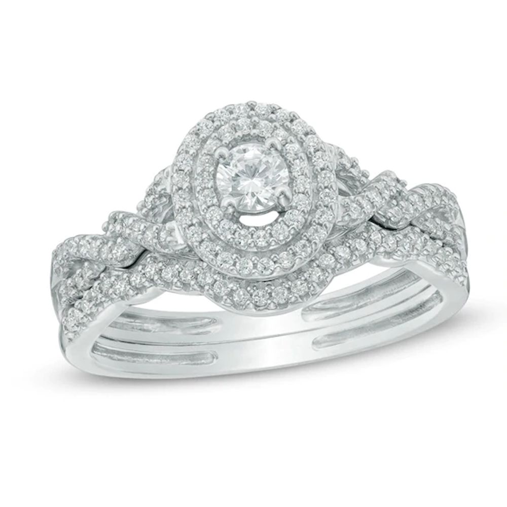 1/2 CT. T.w. Diamond Oval Frame Loose Braid Bridal Set In 10K White Gold