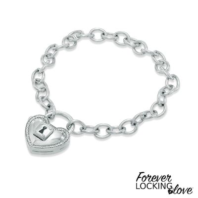 Forever Locking Loveâ¢ 1/10 CT. T.w. Diamond Heart-Shaped Lock Charm Bracelet in Sterling Silver - 7.5"