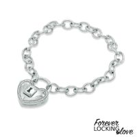 Forever Locking Loveâ¢ 1/10 CT. T.w. Diamond Heart-Shaped Lock Charm Bracelet in Sterling Silver - 7.5"