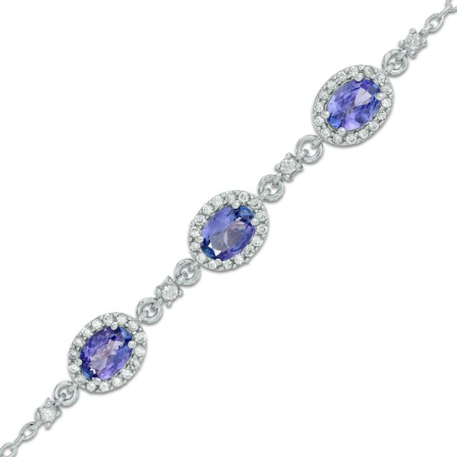Oval Tanzanite and Lab-Created White Sapphire Frame Three Stone Bracelet in Sterling Silver