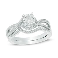 5.5mm Lab-Created White Sapphire and 1/10 CT. T.w. Diamond Swirl Frame Bridal Set in Sterling Silver