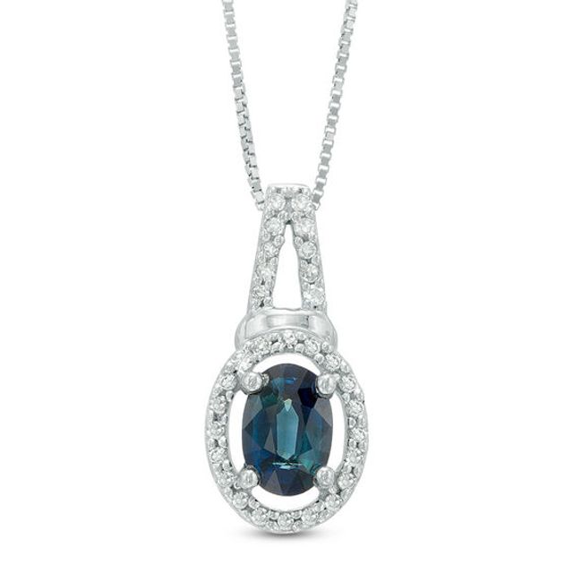 Oval Blue Sapphire and 1/10 CT. T.w. Diamond Frame Pendant in 10K White Gold