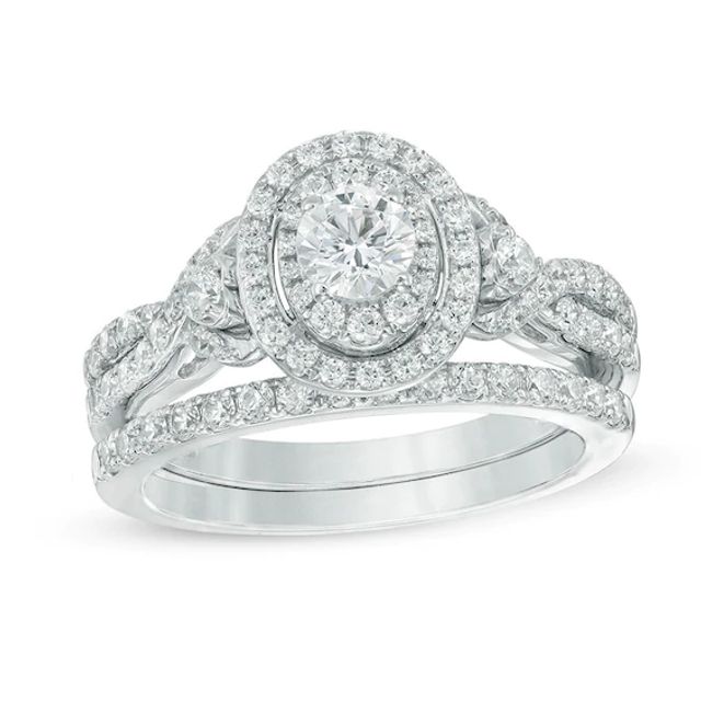 Celebration Ideal 1-1/5 CT. T.w. Certified Diamond Layered Oval Frame Crossover Bridal Set in 14K White Gold (I/I1)