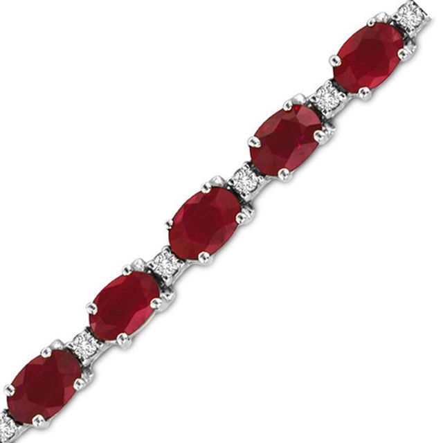 Oval Ruby and 3/8 CT. T.w. Diamond Bracelet in 14K White Gold