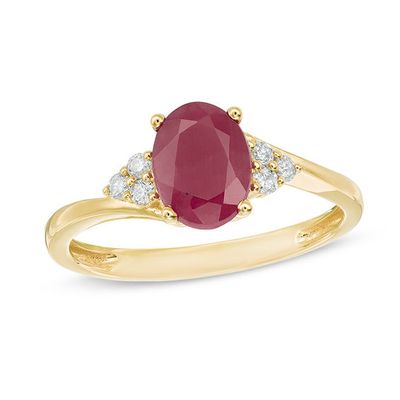 Oval Ruby and 1/10 CT. T.w. Diamond Tri-Sides Ring in 10K Gold