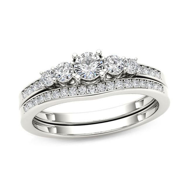 1/2 CT. T.w. Diamond Five Stone Bridal Set in 14K White Gold