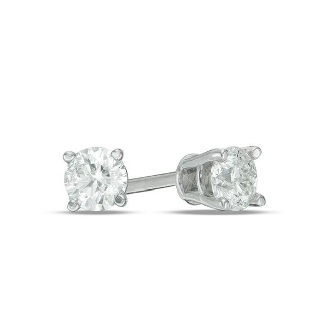 1/ CT. T.w. Diamond Solitaire Stud Earrings in 14K White Gold (I/I2