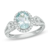 Oval Aquamarine and 1/3 CT. T.w. Diamond Frame Ring in 14K White Gold