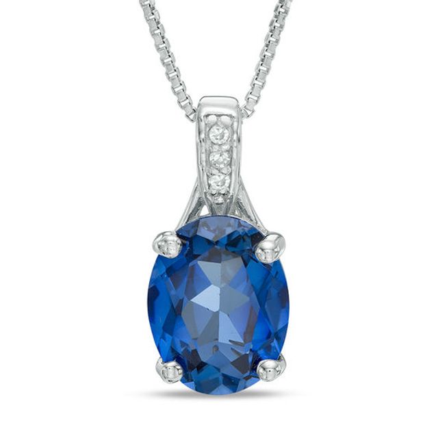 Oval Blue Lab-Created Sapphire and Diamond Accent Pendant in Sterling Silver