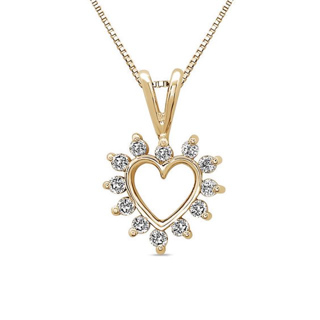 1/6 CT. T.w. Diamond Heart Starburst Pendant in 14K Gold