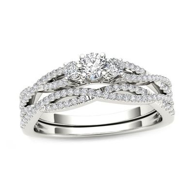 1/2 CT. T.w. Diamond Three Stone Twist Bridal Set in 14K White Gold