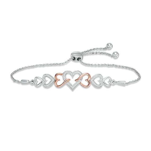 1/10 CT. T.w. Diamond Intertwining Heart Bolo Bracelet in Sterling Silver and 10K Rose Gold - 9.5"