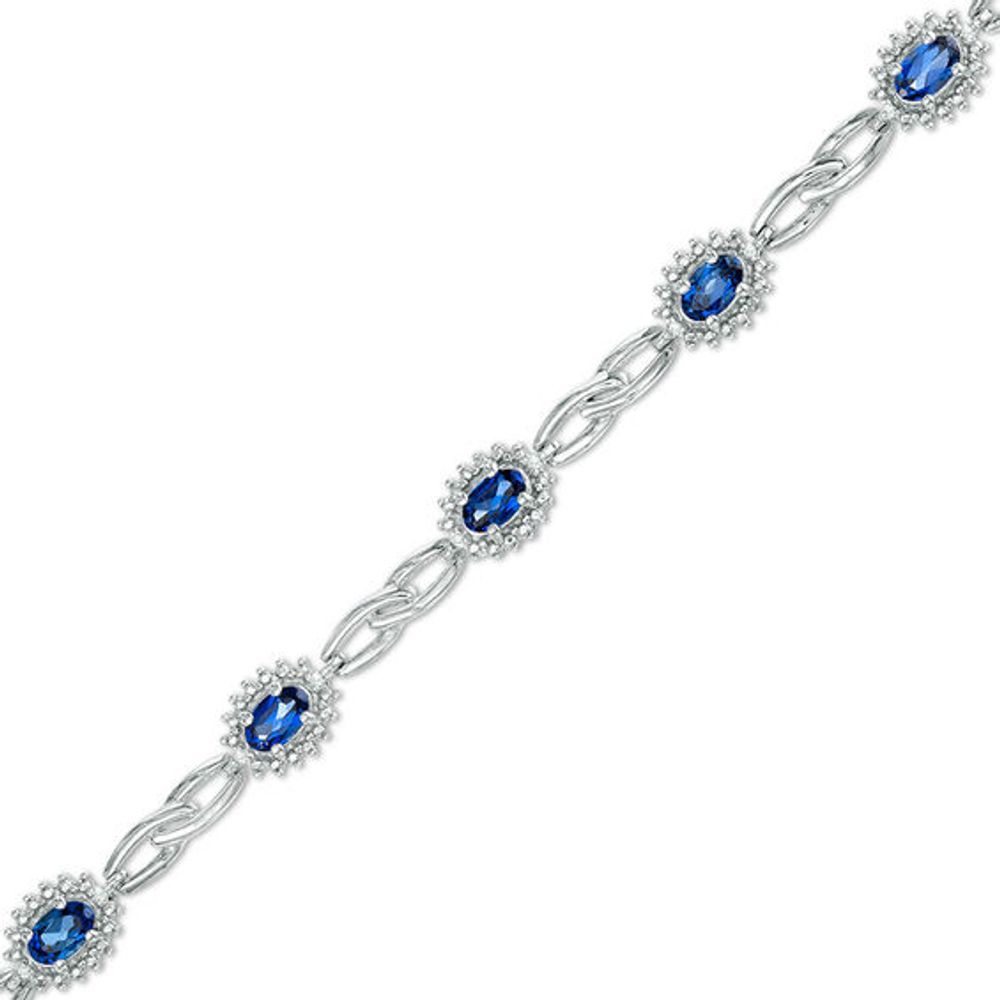 Oval Lab-Created Ceylon Sapphire and Diamond Accent Starburst Frame Link Bracelet in Sterling Silver - 7.5"