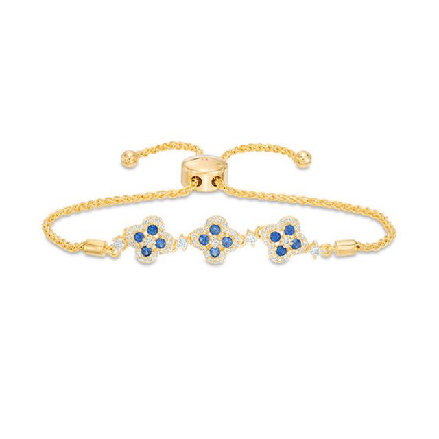 Lab-Created Blue and White Sapphire Triple Flower Bolo Bracelet in Sterling Silver with 18K Gold Plate - 9.0"