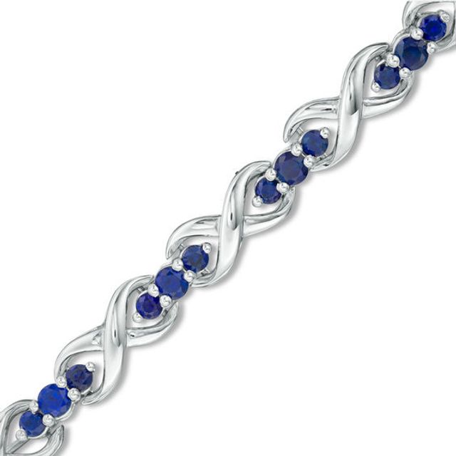 Lab-Created Blue Sapphire Three Stone Infinity Bracelet in Sterling Silver - 7.5"