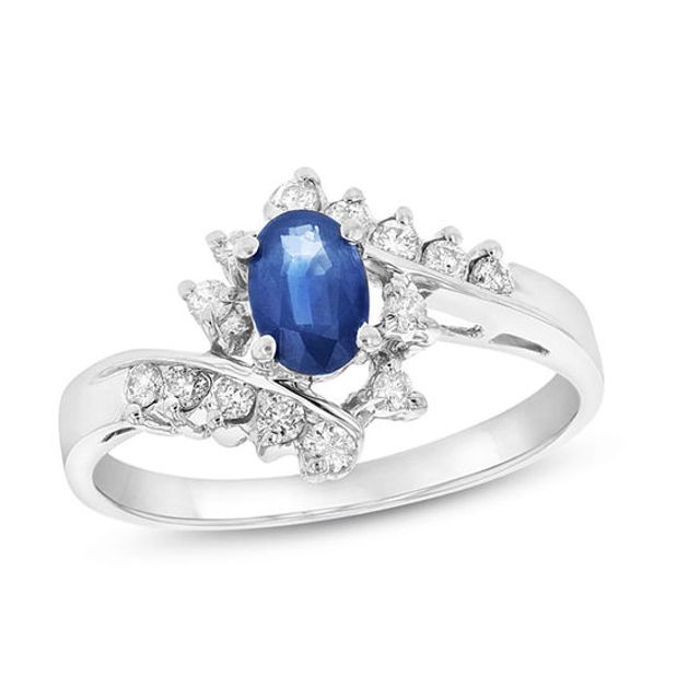 Oval Blue Sapphire and 1/4 CT. T.w. Diamond Bypass Ring in 14K White Gold