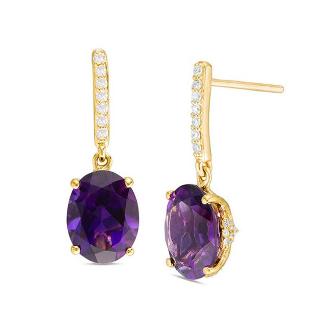 Oval Amethyst and 1/5 CT. T.w. Diamond Drop Earrings in 10K Gold