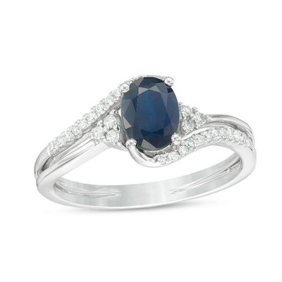 Oval Blue Sapphire and 1/8 CT. T.w. Diamond Tri-Sides Bypass Ring in 10K White Gold