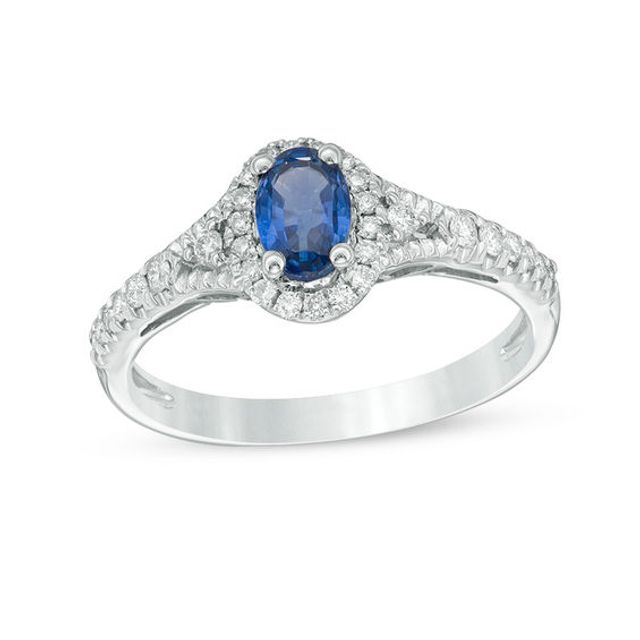 Oval Blue Sapphire and 1/5 CT. T.w. Diamond Frame Ring in 10K White Gold