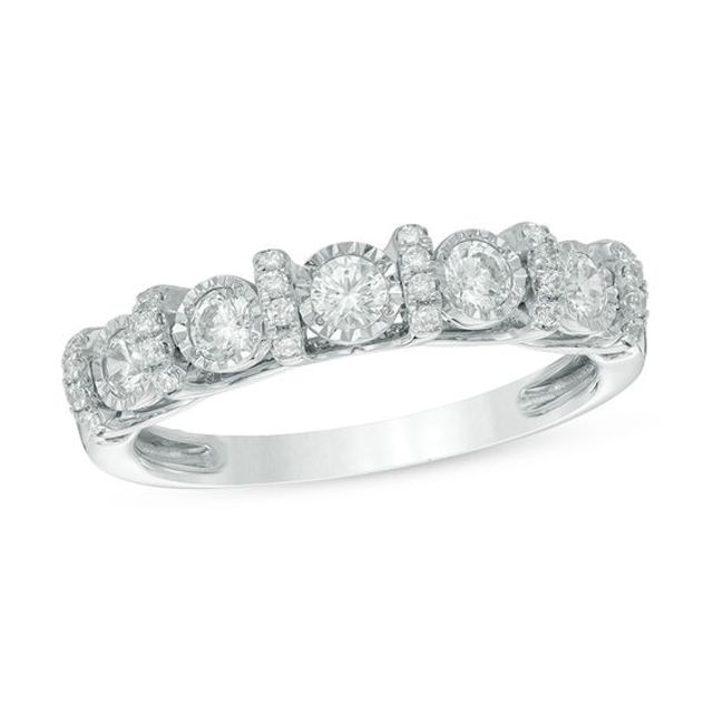 1/2 CT. T.w. Diamond Wedding Band in 10K White Gold