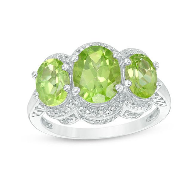 Oval Peridot and Diamond Accent Three Stone Frame Ring in Sterling Silver