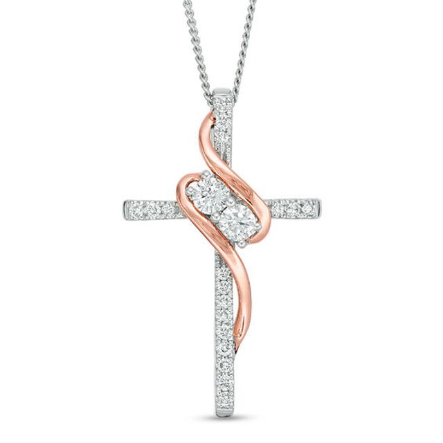 Ever UsÂ® 1/3 CT. T.w. Diamond Two-Stone Swirl Cross Pendant in 14K Two-Tone Gold - 19"