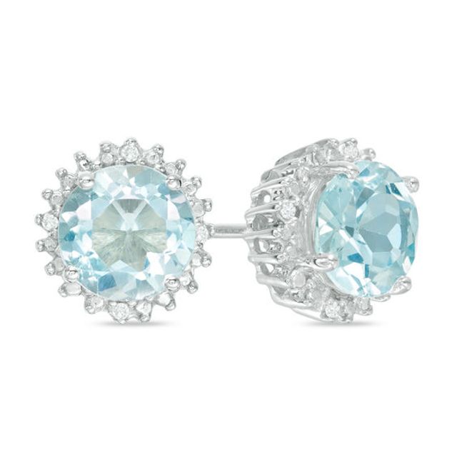 7.0mm Blue Topaz and Diamond Accent Starburst Frame Stud Earrings in Sterling Silver