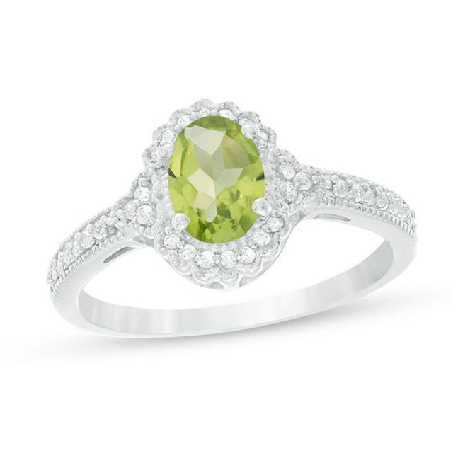 Oval Peridot and 1/8 CT. T.w. Diamond Frame Vintage-Style Ring in 10K White Gold