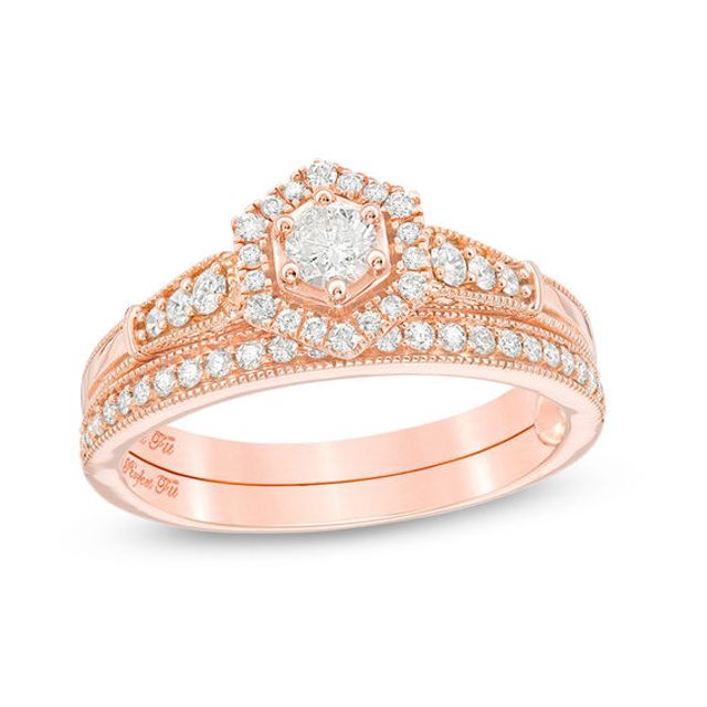1/2 CT. T.w. Diamond Hexagon Frame Vintage-Style Interlocking Bridal Set in 10K Rose Gold