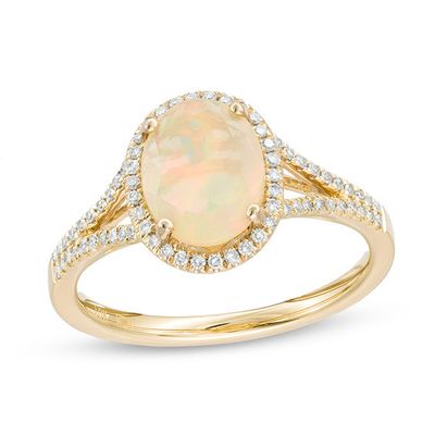 Oval Opal and 1/5 CT. T.w. Diamond Frame Split Shank Ring in 10K Gold