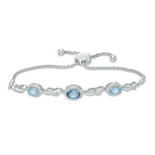 London and Swiss Blue Topaz with Lab-Created White Sapphire Frame Three Stone Bolo Bracelet in Sterling Silver - 9.0"