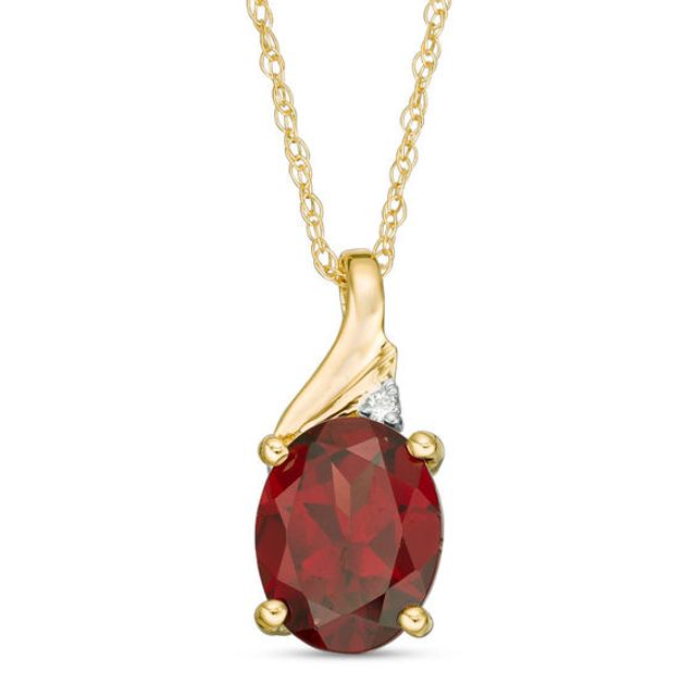 Oval Garnet and Diamond Accent Swirl Top Pendant in 10K Gold