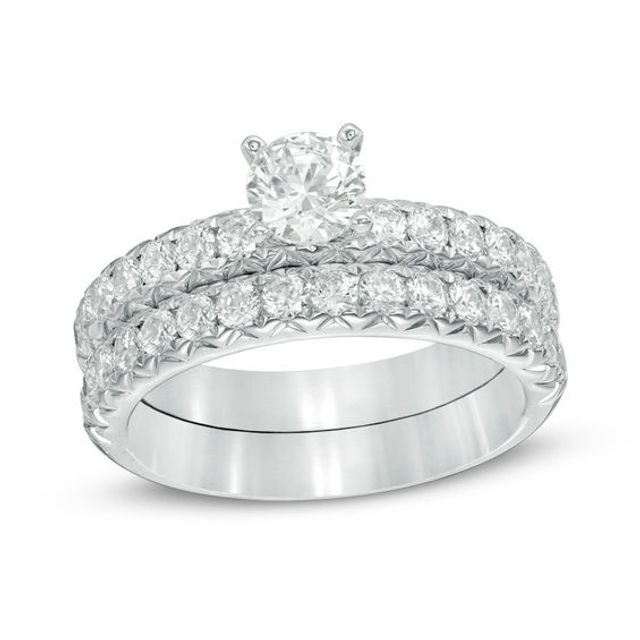 1-1/2 CT. T.w. Certified Diamond Bridal Set in 14K White Gold (I/Si2)