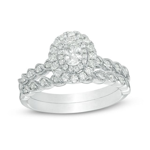 3/4 CT. T.w. Oval Diamond Double Frame Twist Vintage-Style Bridal Set in 14K White Gold