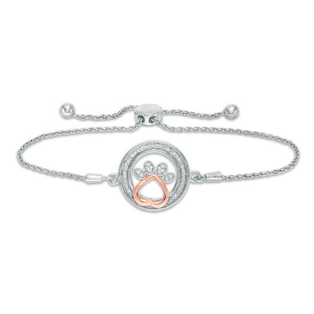 1/15 CT. T.w. Diamond Open Circle with Paw Print Bolo Bracelet in Sterling Silver and 10K Rose Gold (1 Line) - 9.5"