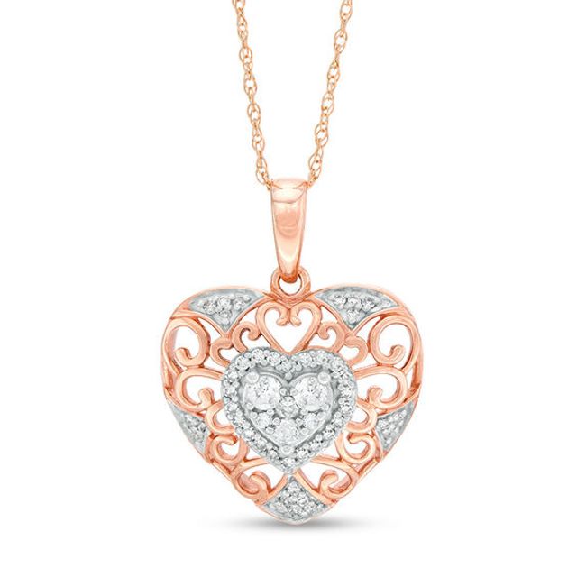 1/4 CT. T.w. Diamond Filigree Heart Pendant in 10K Two-Tone Gold