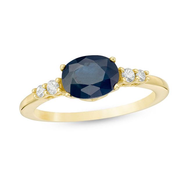 Oval Blue Sapphire and 1/10 CT. T.w. Diamond Ring in 10K Gold