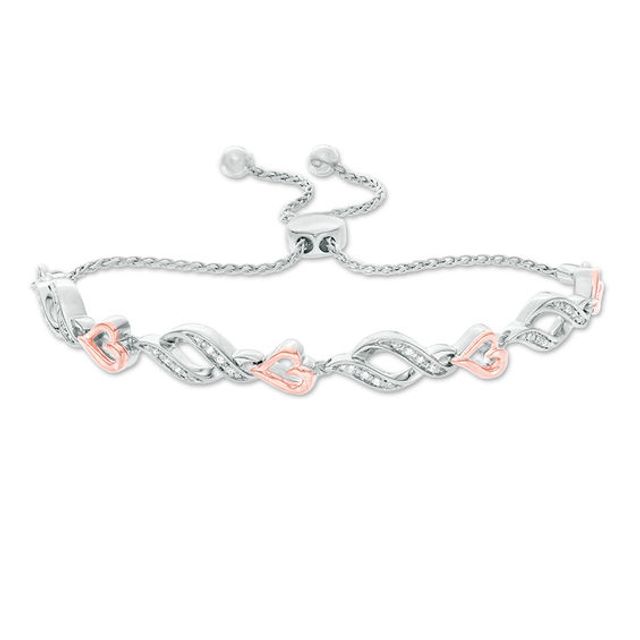 1/20 CT. T.w. Diamond Sideways Heart and Flame Link Bolo Bracelet in Sterling Silver and 10K Rose Gold - 9.5"