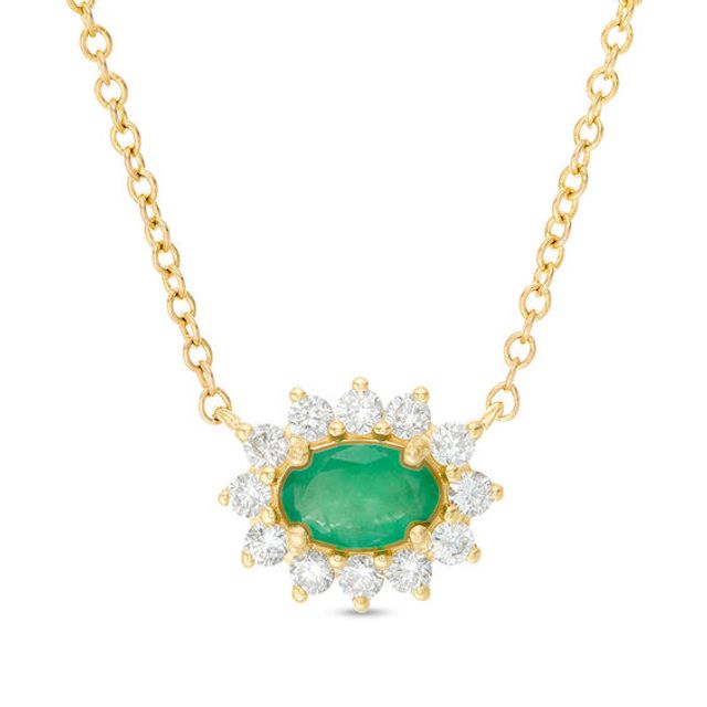 Sideways Oval Emerald and 1/5 CT. T.w. Diamond Starburst Frame Necklace in 10K Gold