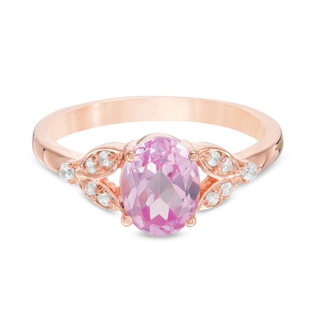 Oval Lab-Created Pink Sapphire and 1/10 CT. T.w. Diamond Leaf Sides Ring in 10K Rose Gold