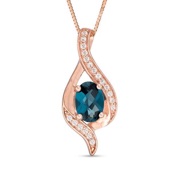 Oval London Blue and White Topaz Ribbon Flame Pendant in 10K Rose Gold