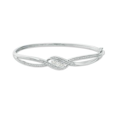 1/5 CT. T.w. Diamond Three Stone Bypass Ribbon Bangle in Sterling Silver