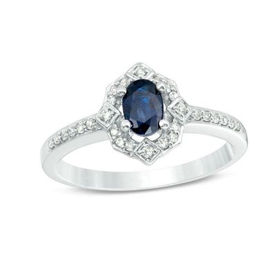 Oval Blue Sapphire and 1/8 CT. T.w. Diamond Flower Petals Flame Ring in 10K White Gold