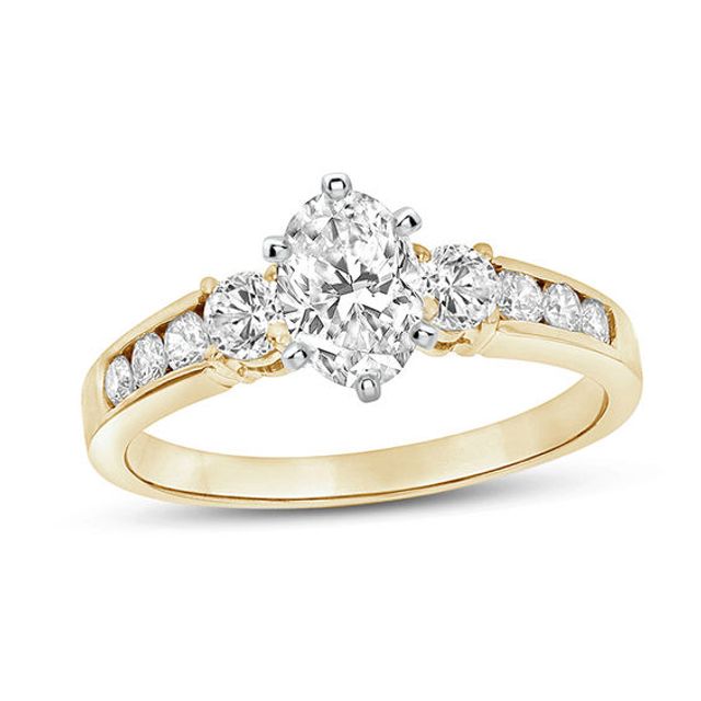 1 CT. T.w. Oval Diamond Three Stone Engagement Ring in 14K Gold (J/Si2)