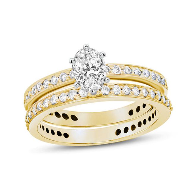 1 CT. T.w. Oval Diamond Bridal Set in 14K Gold (J/Si2)