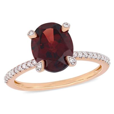 Oval Garnet and 1/10 CT. T.w. Diamond Engagement Ring in 10K Rose Gold