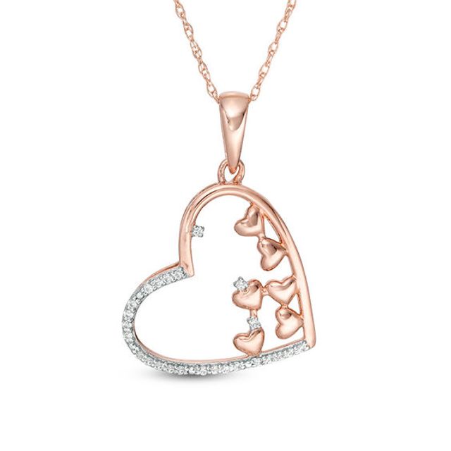 1/10 CT. T.w. Scattered Diamond Tilted Heart Outline Pendant in 10K Rose Gold