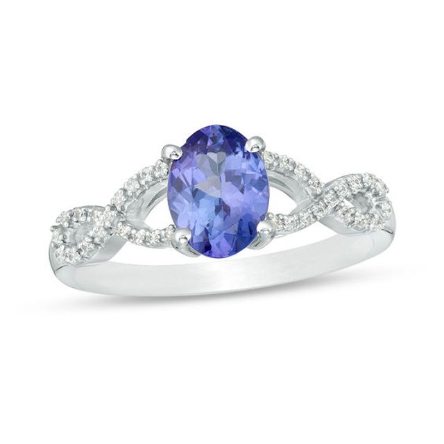 Oval Tanzanite and 1/15 CT. T.w. Diamond Twist Shank Ring in 10K White Gold