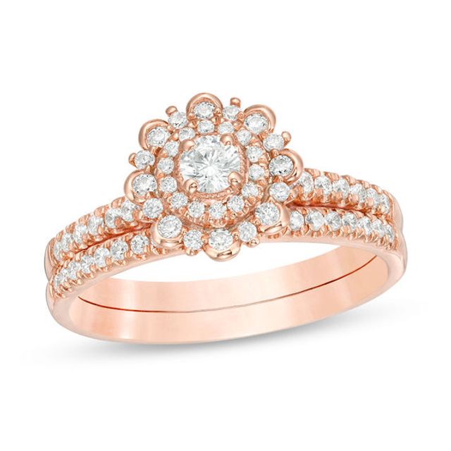 1/2 CT. T.w. Diamond Flower Frame Bridal Set in 14K Rose Gold